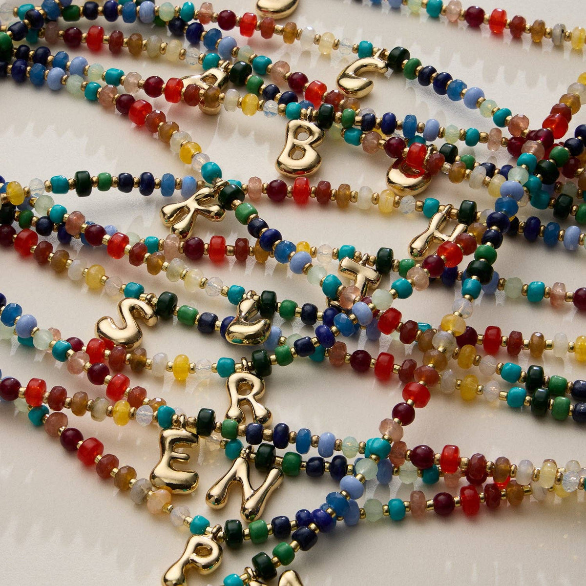 Vibrant Beaded Necklace with Personalized Gold Initial Charm